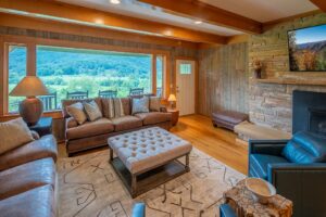 Living room at Valle View Retreat with a view across the valley
