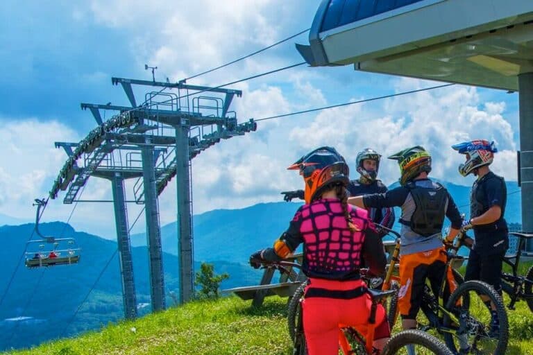 Mountain bikers at the Sugar Mountain chairlift in summer