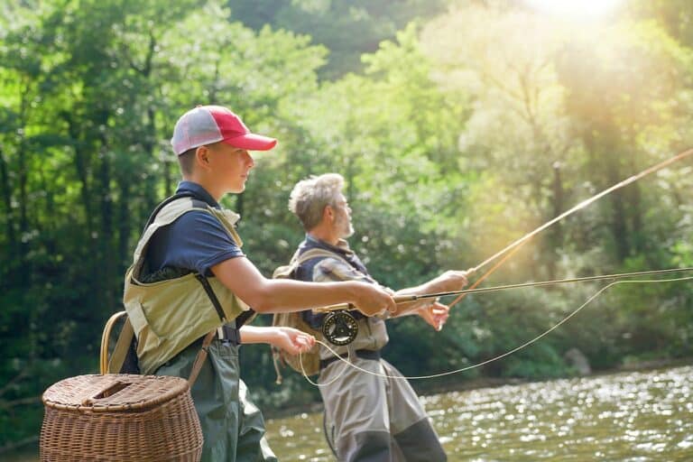 Fly fishing guide and angler on a mountain trout stream