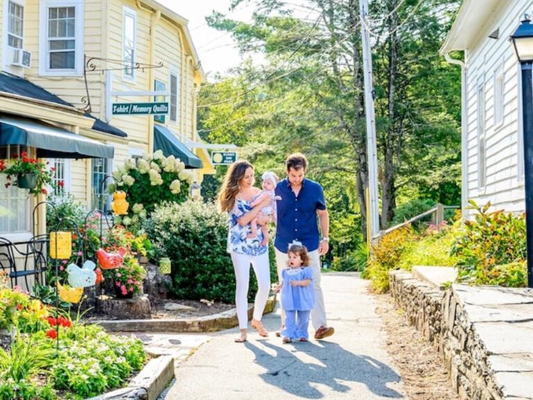 Family walking along Main Street in Blowing Rock
