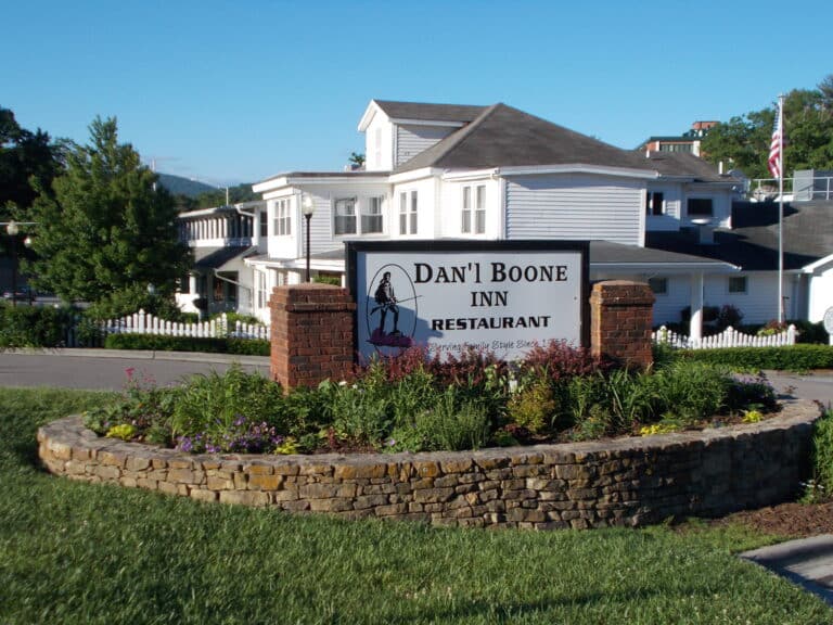 Dan'l Boone Inn restaurant sign and white building in Boone