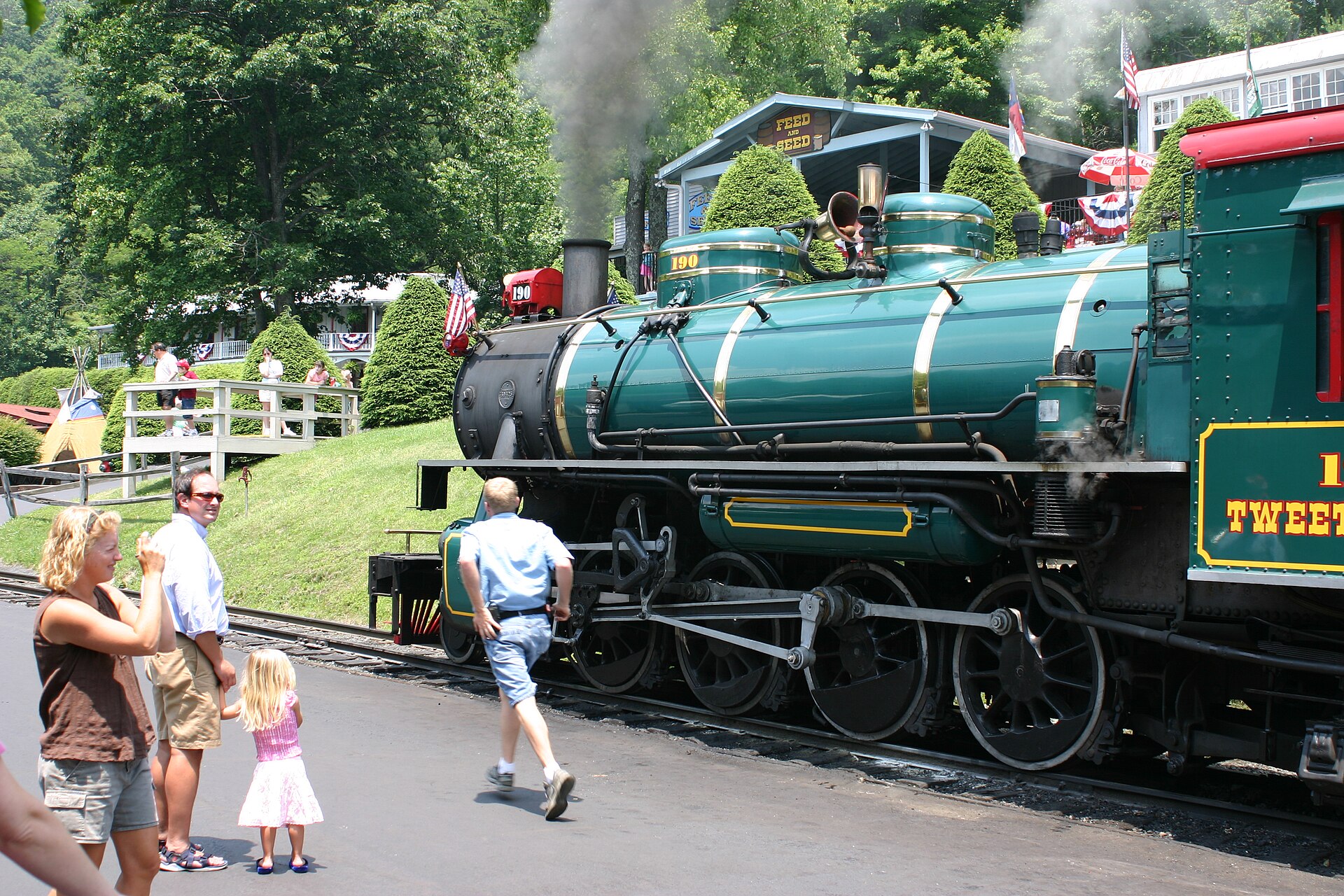 Family watching the Tweetsie Railroad No. 190 steam locomotive